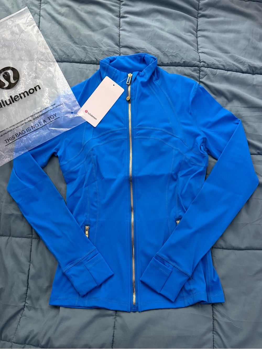 (NWT) Define Lululemon Jacket Blue w/ Gold Hardware in Original Packaging